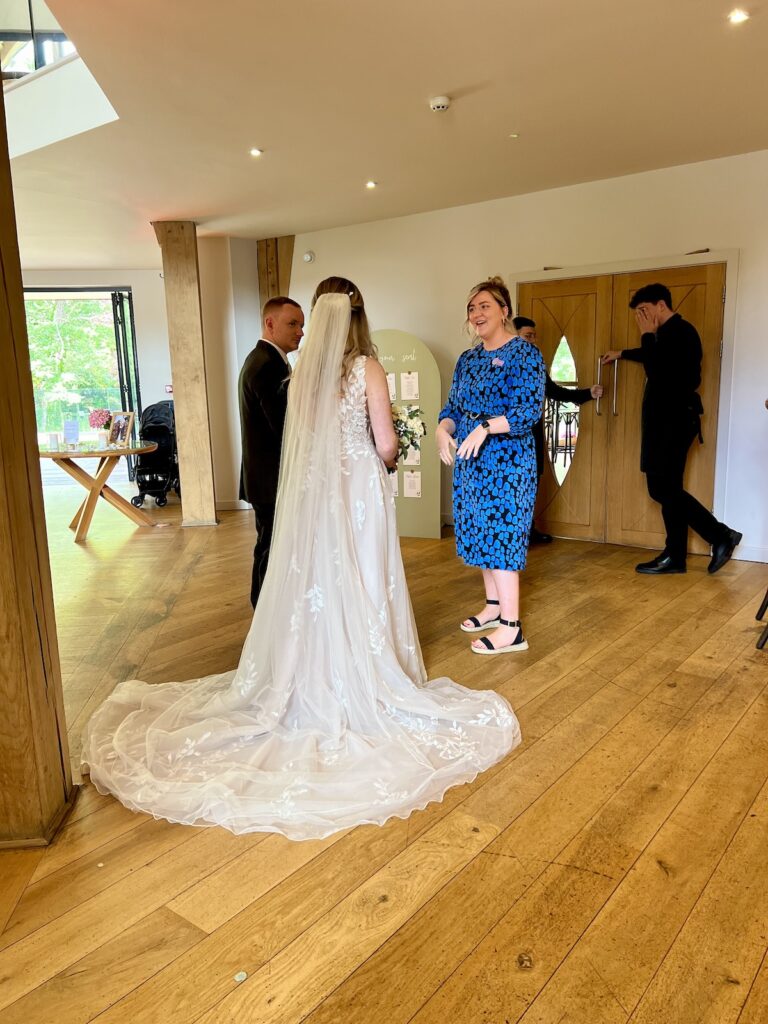 Bride and Groom Going into the wedding breakfast