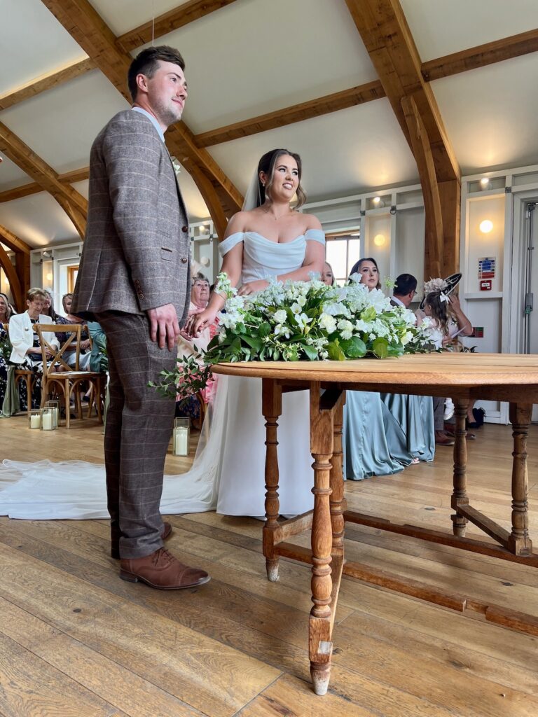 Bride and Groom at their wedding ceremony - Hyde House in the Cotswolds