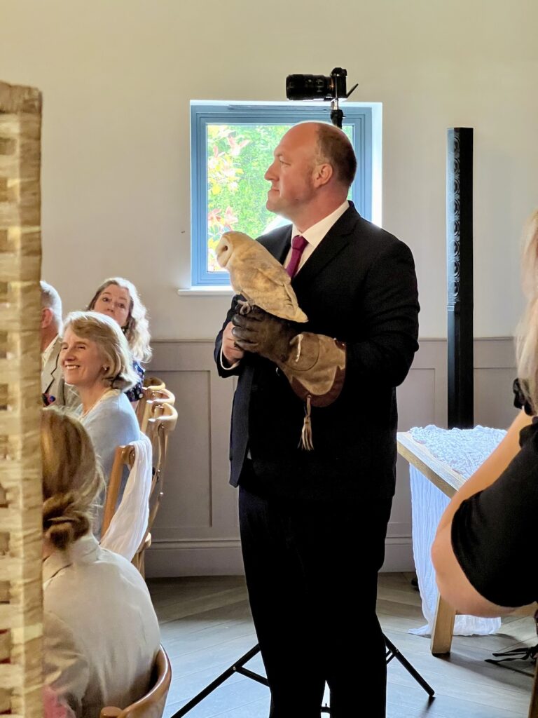 Owl being used as a ring bearer at Stretton Manor Barn