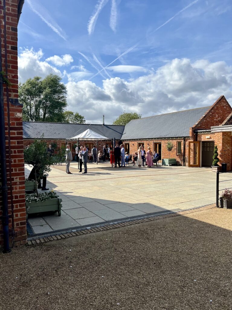 Apton Hall outside drinks reception in courtyard