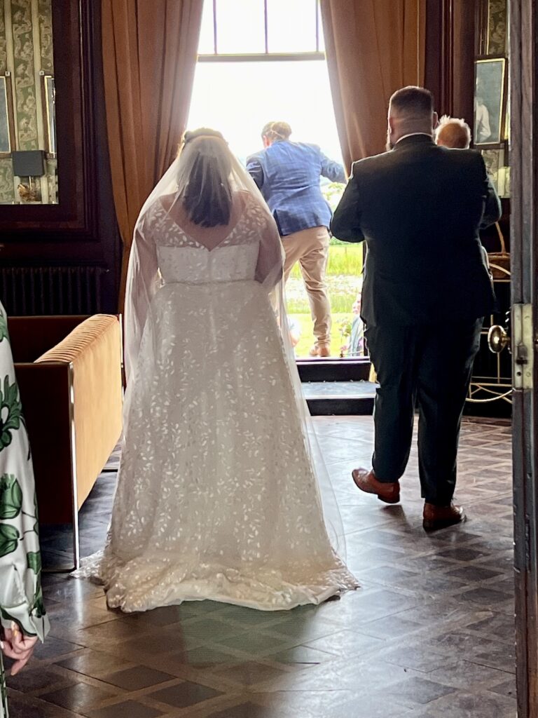 Bride and Groom walking outside