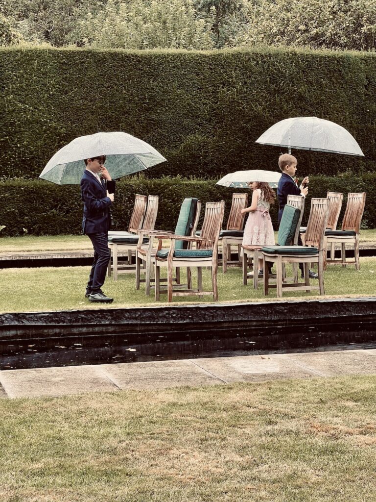 Cotswolds Wedding in the rain with children