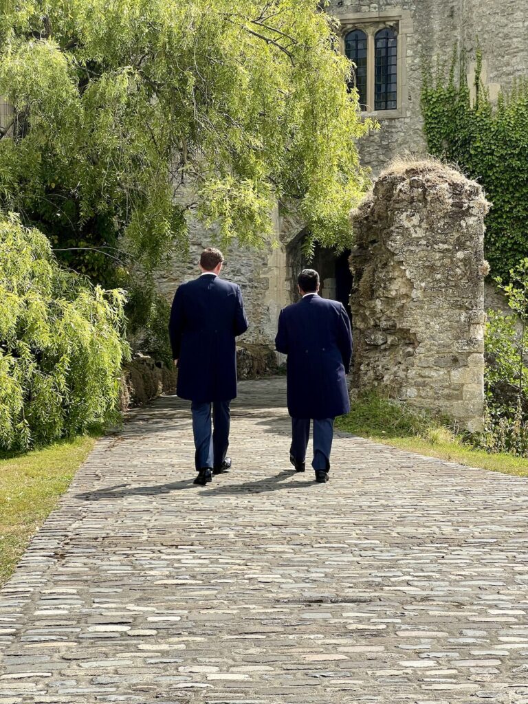 Groom and Best Man in Tails at a castle