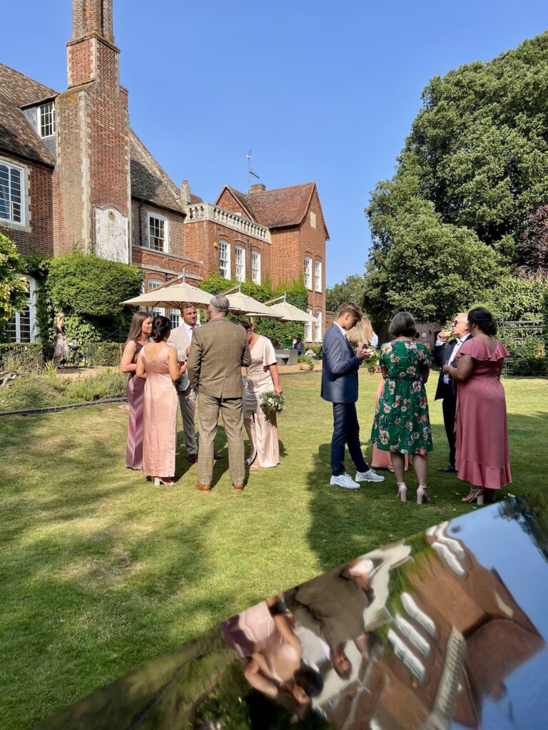 Hockwold Hall in Norfolk outside drinks reception for wedding