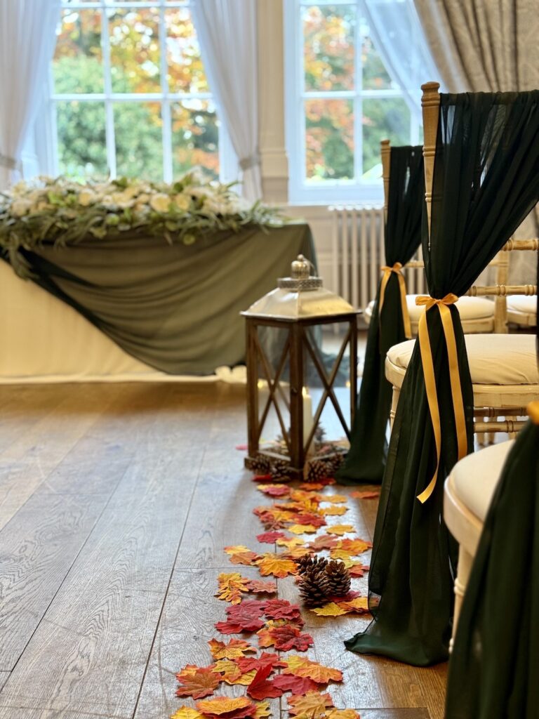 Aisle flowers in autumnal colours at Bawtry Hall near Doncaster