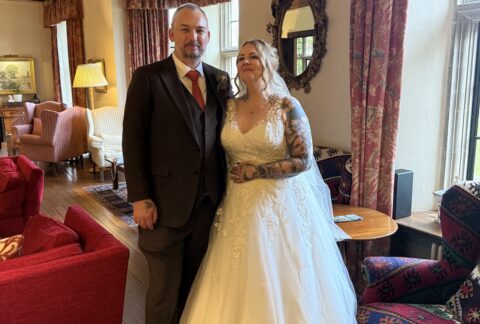 Wedding couple and bride with beautiful white dress at Llangoed Hall in Wales