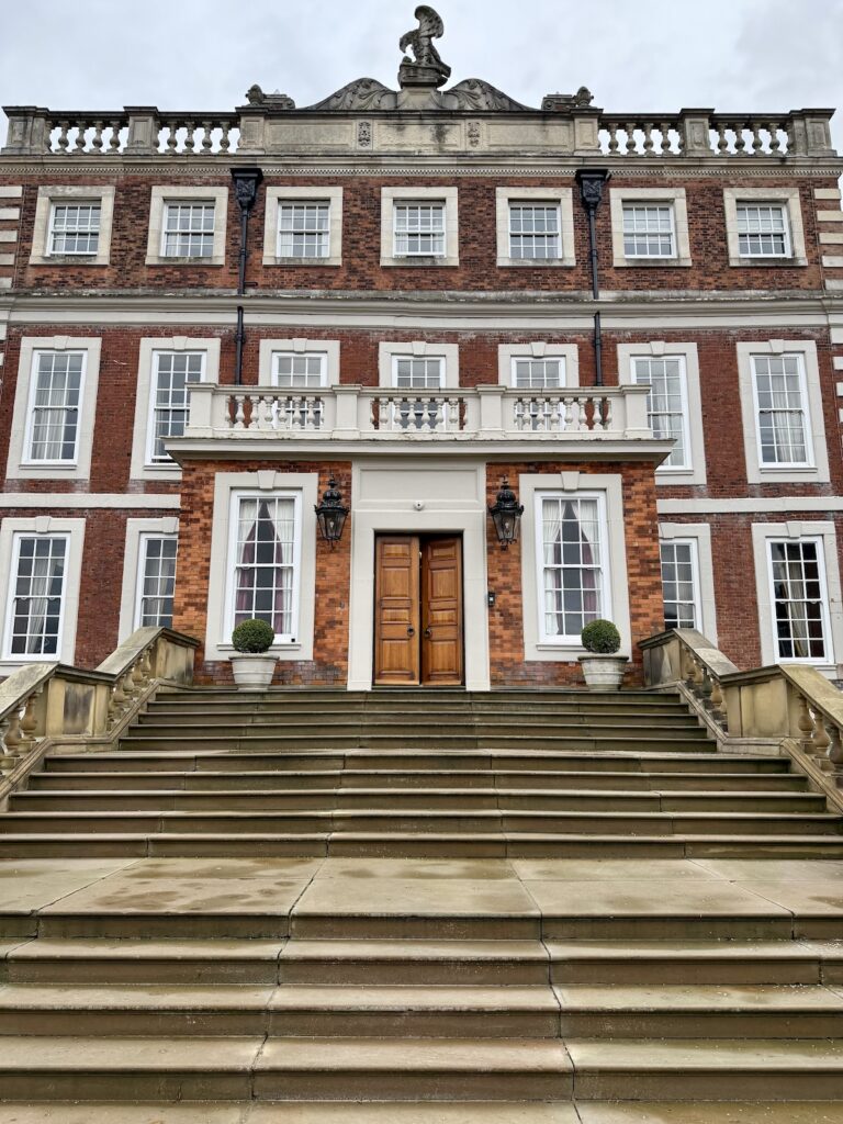 Knowsley Hall Main Entrance with steps up to wooden door