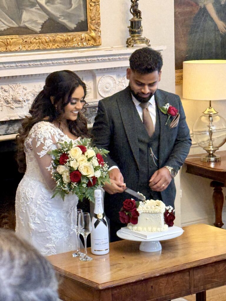 Cutting the Wedding Cake at Norwood Hall Nottinghamshire