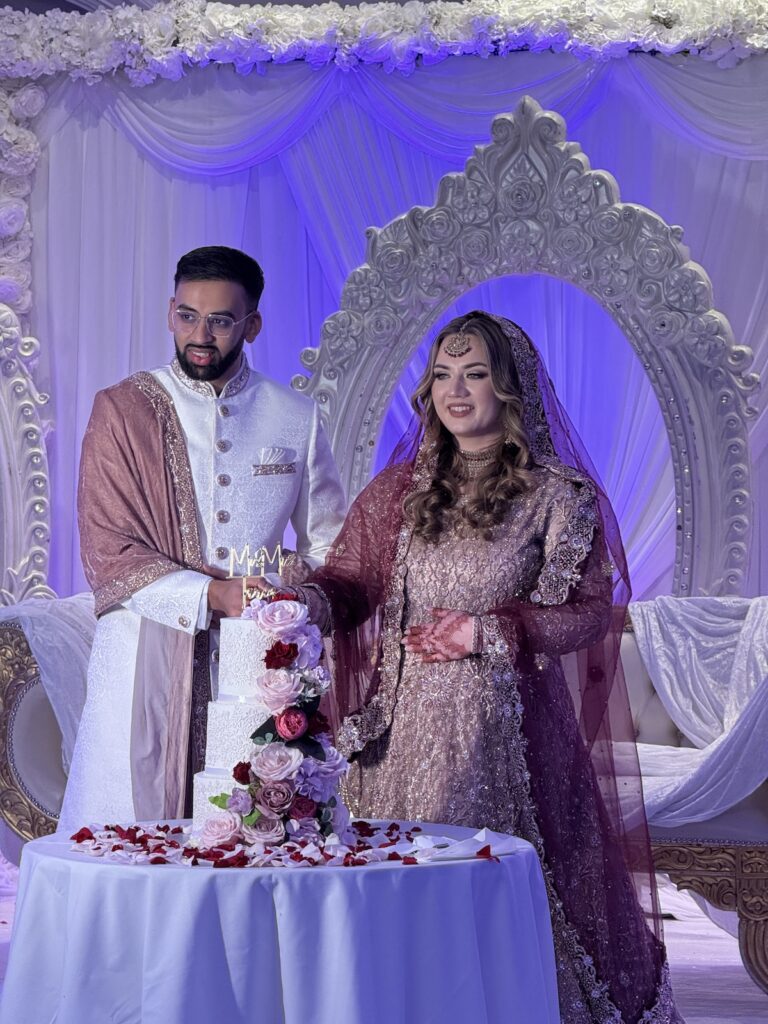 Wedding Couple Bollywood Asian Wedding cutting cake